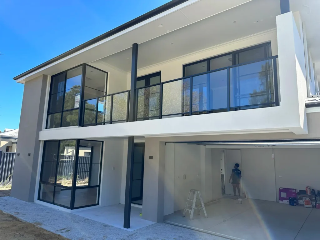 Builders window cleaning on a new home in Wembley Downs, Perth